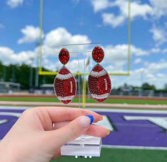 Beaded red and white football earrings