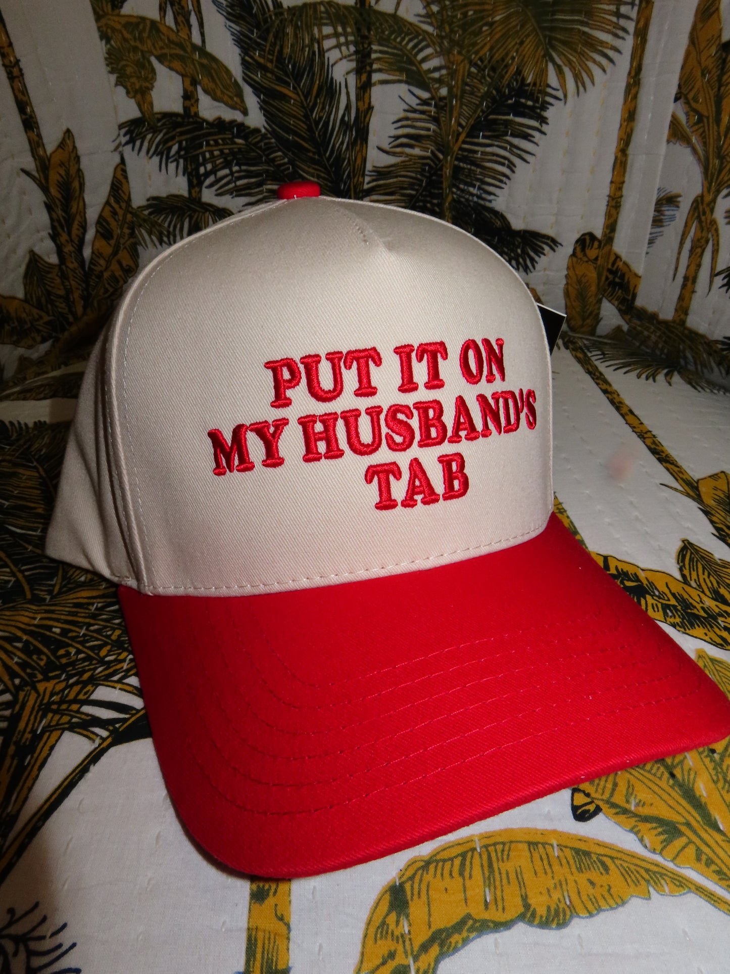 Embroidered Put It On My Husband’s Tab Trucker Hat